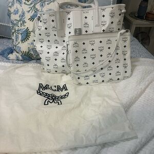 MCM white logo monogram tote with matching wristlet.
